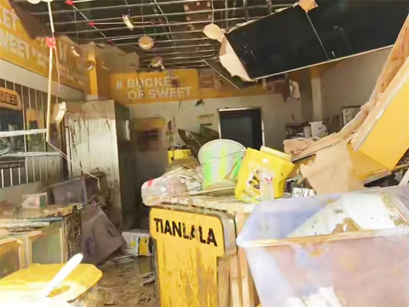 兩遭洪水重創(chuàng)后，“甜啦啦”門店迎來重生